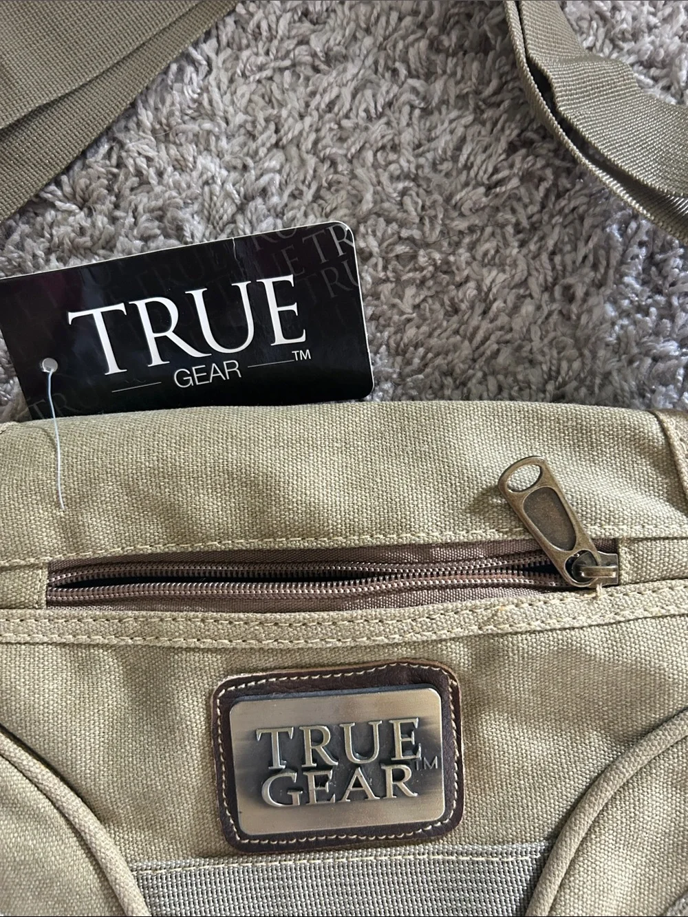 Tan/khaki  Messenger crossbody Bag with Adjustable Strap. Waterproof liner
